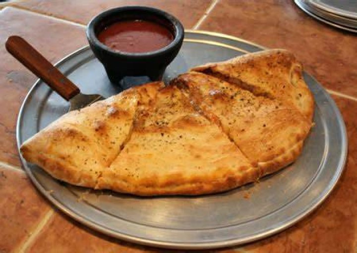 Why is a calzone called a calzone?